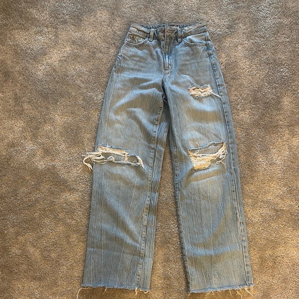 distressed medium blue jeans